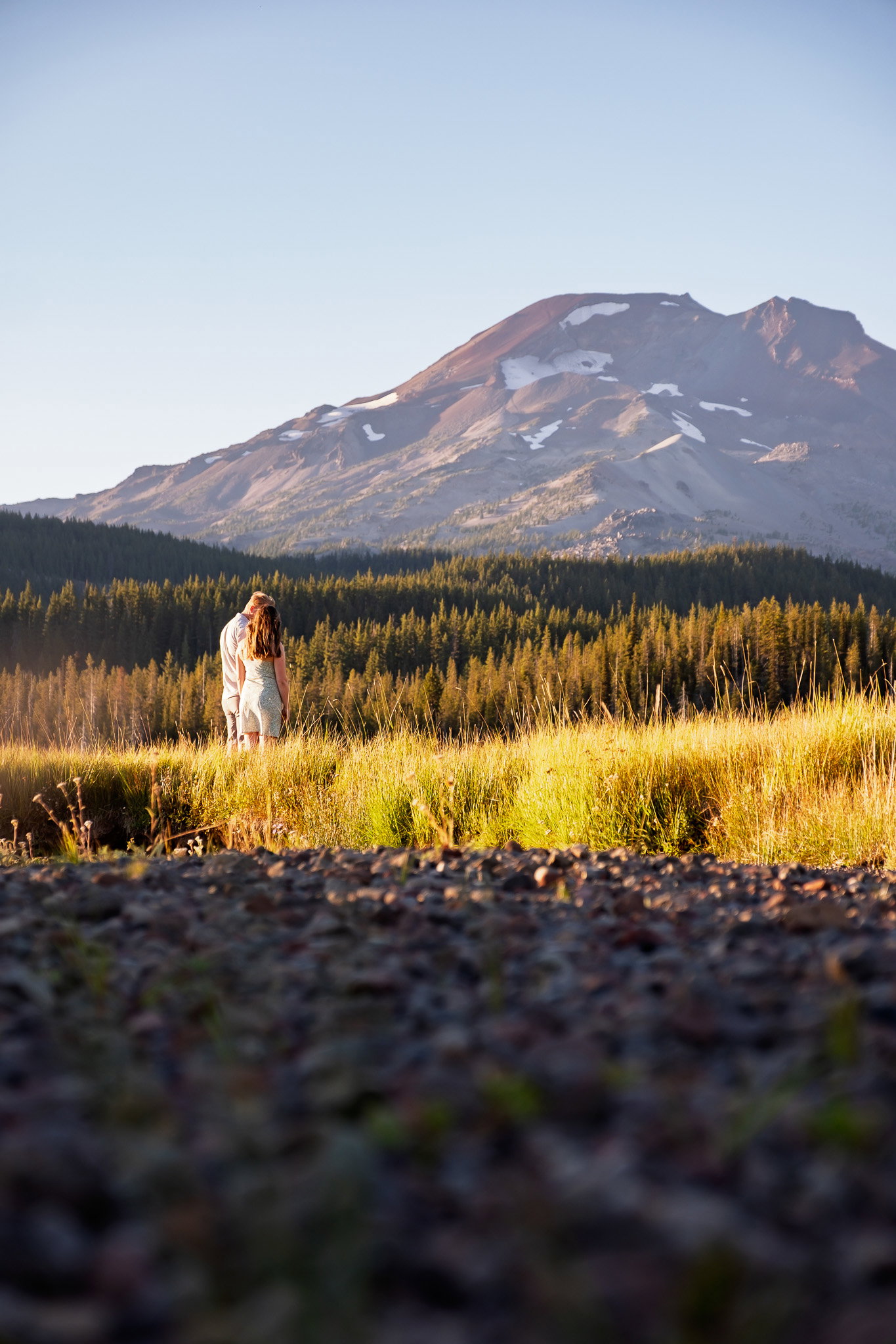 The two of them small beneath South Sister